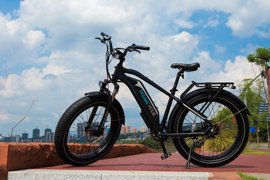 Fixed or A Detachable E-bike Battery? Let Me Tell You magicycle cruiser pro mid step-thru electric mountain bike