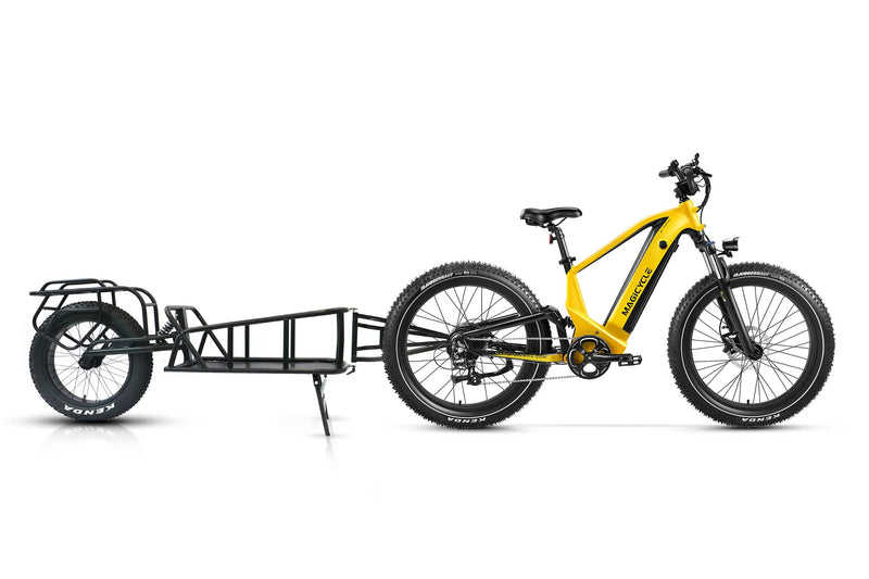 Yellow Magicycle Deer e-bike with black cargo trailer for outdoor use