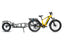 Yellow Magicycle Deer e-bike with cargo trailer for versatile outdoor adventures.