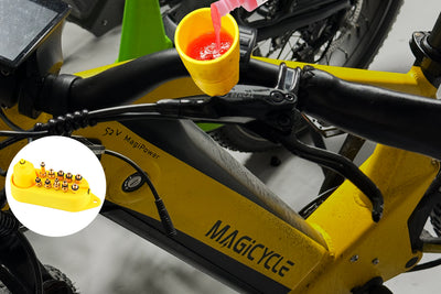 Hydraulic brake bleed kit with yellow funnel on Magicycle ebike handlebar
