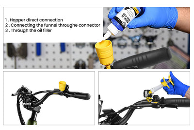 Injecting fluid into hydraulic brake funnel on Magicycle ebike handlebar.