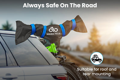 Magicycle handlebar cover displayed on e-bike roof rack, featuring blue straps and safety text.
