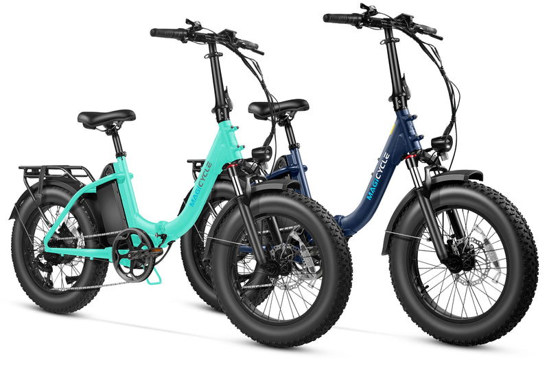 Teal and navy blue Magicycle Jaguarundi 2.0 fat tire electric bikes for outdoor adventures.