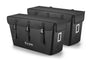Large black cargo pannier bags for bicycles with reflective strips and secure buckles