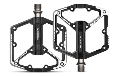 Lightweight black and silver bicycle pedals with ergonomic design and 3 bearings.