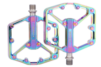 Vibrant rainbow bicycle pedals featuring ergonomic design and 3 high-speed bearings.