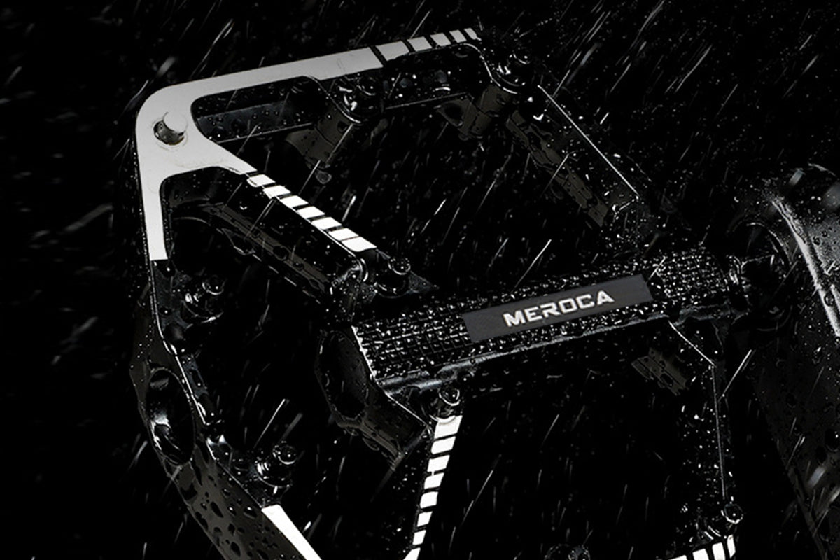 Durable black bicycle pedal with MEROCA branding, designed for wet conditions.