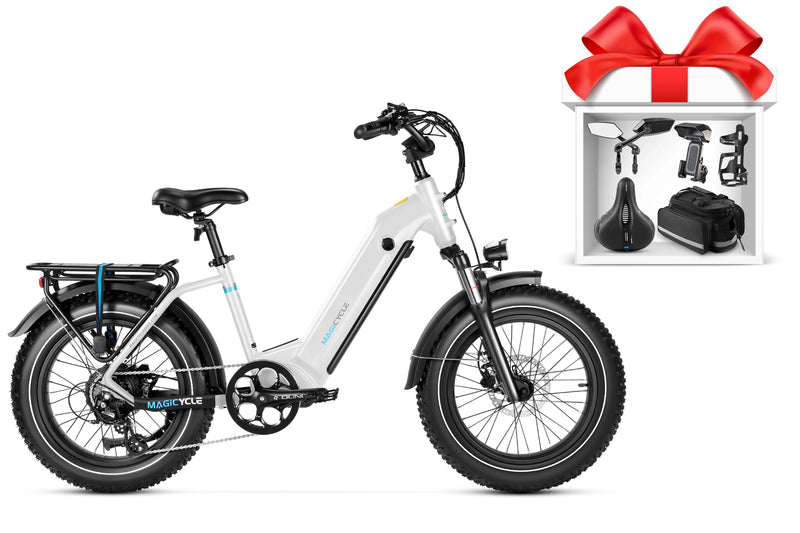 White Magicycle Ocelot Pro Fat Tire Electric Bike with accessories in a gift box.