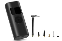 Portable tire inflator with digital display and multiple nozzles for versatility