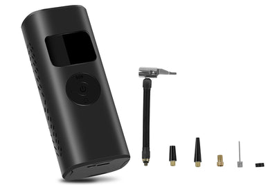 Portable tire inflator with digital display and multiple nozzles for versatility