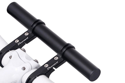 Black Deemount bike handlebar extender for added space and mounting accessories.