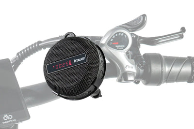 Compact Bluetooth speaker on e-bike handlebars showing battery and time display.